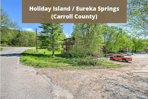 Aerial view of Lot 13, Block 01, Section 15 in Holiday Island, Carroll County, Arkansas, showing wooded lot for sale.