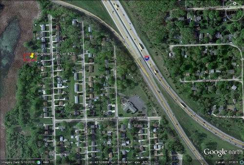 Brighton, Livingston County, Michigan $1,000 cash, local area photo with community details and cash display.