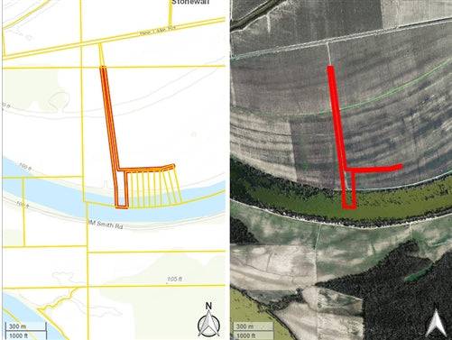 Aerial view of Mississippi Holmes County Bee Lakefront 14.21-acre property in Holmes County, showing lake and surrounding land.