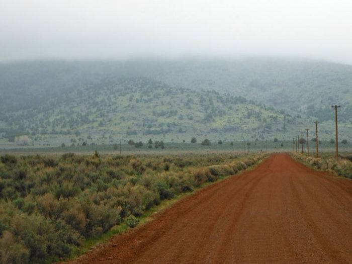 Aerial view of Moon Valley Ranch in Lassen County, California, showing 20-acre lot with surrounding natural landscape.