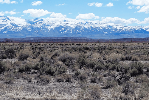 Aerial view of Nevada Elko County Humboldt Acres Lot 2, 1.07-acre property with visible land boundaries and surrounding landscape.