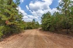 Aerial view of Latimer County, Oklahoma, 14.67-acre lot near Stone Bridge, Lot 41, with natural landscape and property boundaries.