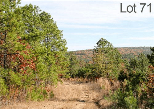 Aerial view of Oklahoma Latimer County Stone Creek Ranch Lot 71, a 25.36-acre property with open land and natural features.