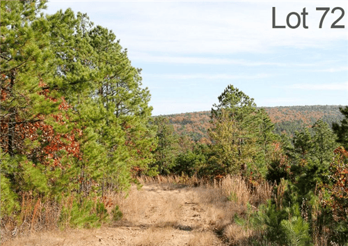 Aerial view of Oklahoma Latimer County Stone Creek Ranch Lot 72, 27.14 acres with natural landscape and creek features.