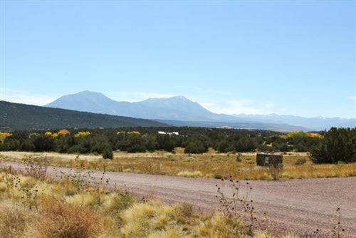 Aerial view of Colorado Huerfano County Black Diamond Peak lot with electric and water access, .76-acre parcel for sale.