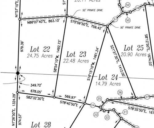 Aerial view of 22.48-acre Antler Ridge property in Shannon County, Missouri, featuring wooded land and scenic landscape.