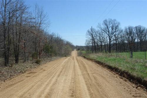 10-acre Whispering Oaks Ranch in Texas County, Missouri, with trees and open land, offered by Onlinelandsales.