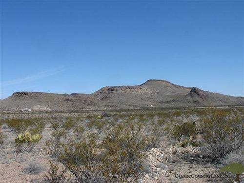 20-acre Texas land in Brewster County on Terlingua Ranch, with Onlinelandsales branding, showing a scenic view of the property.