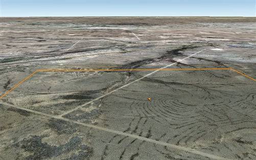 Aerial view of a 10-acre land parcel in Reeves County, Texas, showcasing open desert terrain with sparse vegetation.