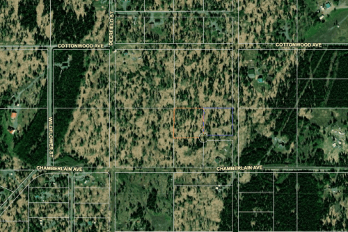 Aerial view of the Alaska Kenai Peninsula Wolverine Flats Lot 62, showing expansive 2.05-acre land in a natural landscape.
