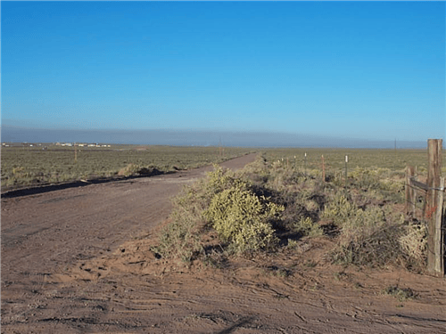Aerial view of Navajo County, Arizona, 1.25-acre Rancho Lot 106, showing desert landscape and property boundaries in Arizona.