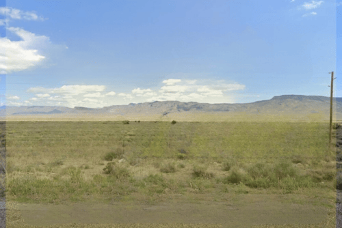 Arizona Mohave County 1.07-acre Ranchette lot 352, Unit 1, showing dry desert landscape and clear blue sky.