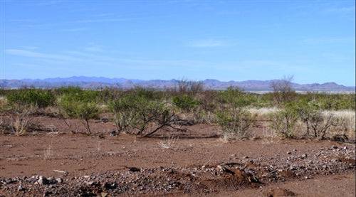 Aerial view of a 0.21-acre Cochise College Estates parcel in Cochise County, Arizona, with surrounding desert landscape.