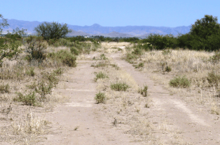 Aerial view of Arizona Sunsites Lot 13, Block 942 in Cochise County, showing land plot and surrounding desert terrain.