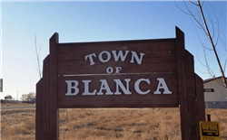 Aerial view of Colorado's Costilla County Town of Blanca Lot 5, Block 155, showing undeveloped land on Onlinelandsales website.