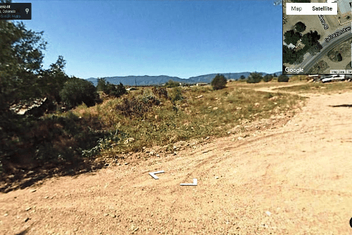 Aerial view of Colorado Fremont County 0.13-acre lot 6, showing open land near Florence with natural landscape.