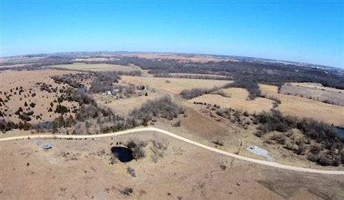 Aerial view of Kansas Cowboy Meadows property in Chautauqua County, showing 9.29 acres of open land and natural landscape.