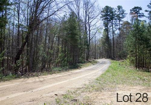 Aerial view of Kentucky Rock Castle County 13.64-acre Chestnut Oak Ridge lot 28, showing wooded terrain and natural landscape.