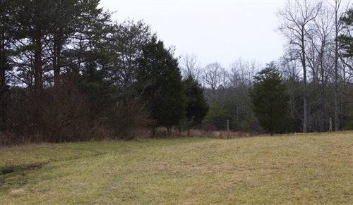 Aerial view of Majestic Rock Ranch with 6.64 acres in Rock Castle County, Kentucky, showcasing rugged terrain and scenic landscape.