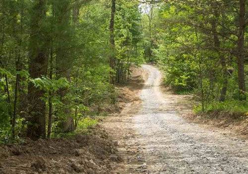 Aerial view of 5.26-acre lot at Trails End in Rock Castle County, Kentucky, showing wooded land and open space.