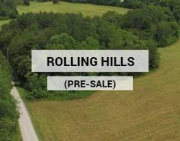 A scenic view of rolling hills and open land in Wayne County, Kentucky, showing multiple property lots in a rural setting.