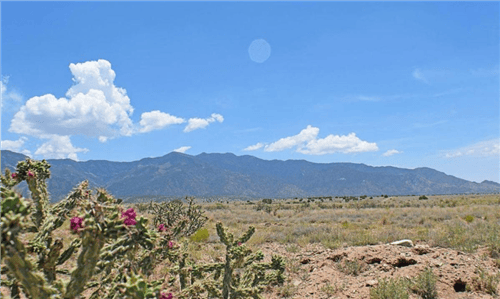 Aerial view of Valencia County, New Mexico, showing 0.25-acre Rio Del Oro Lot 04 Block 41 in the NM Valencia Rio Del Oro real estate development.