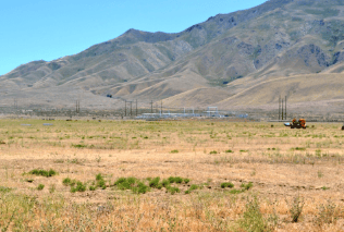 Aerial view of Nevada Washoe County Pyramid Lake Ranches Lot 56 with mountain views, showcasing the 10.07-acre land parcel.