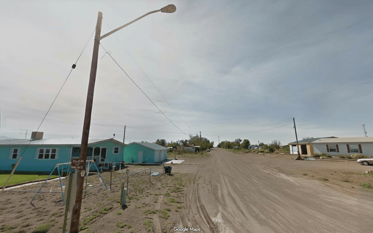 Aerial view of Colorado Alamosa County 0.32-acre Hooper Block 10 lots 18-21 with visible land and surrounding area.