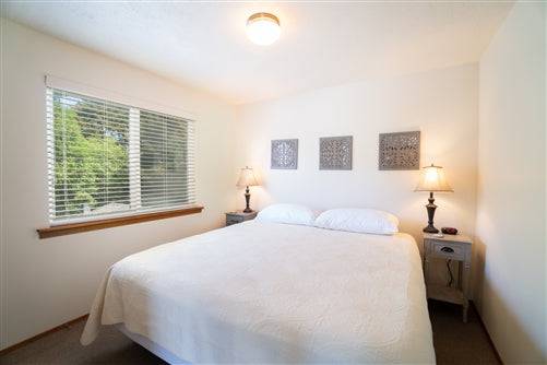 Sea Base Oregon Beach House rental deposit from Onlinelandsales, featuring a cozy beach house with ocean views and landscaped surroundings.