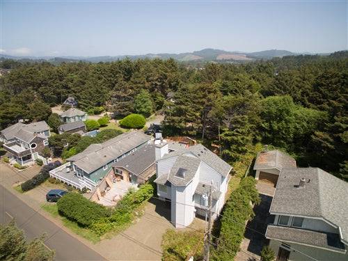 Sea Base Oregon Beach House rental deposit, showing the exterior view of the beachfront property with ocean scenery.