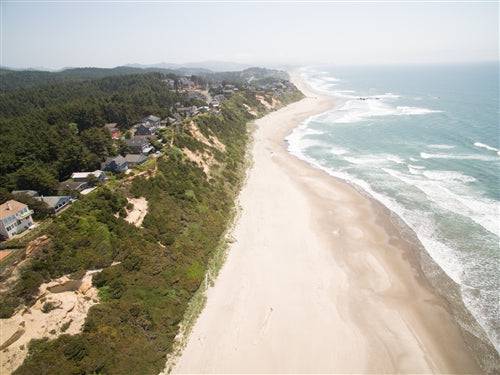 Sea Base Oregon beach house rental deposit from Onlinelandsales, featuring a cozy coastal property with beach access.