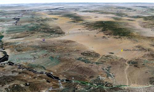 Aerial view of 1.25-acre Lake Havasu land lot in Mohave County, Arizona, with surrounding desert and water features.