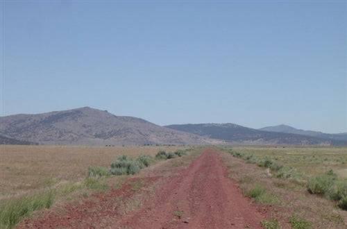 Aerial view of California Lassen County Moon Valley Ranch Lot 72, 20.20 acres of open land and natural landscape in Lassen County.