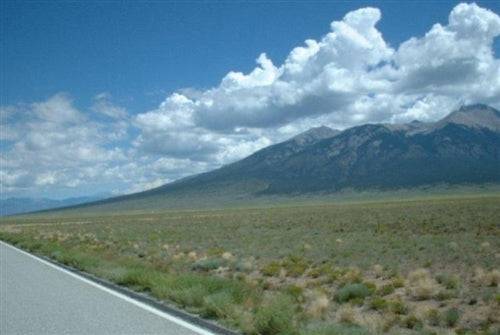 Aerial view of Colorado's Mount Blanca Valley Ranches in Alamosa County, showing open 5-acre parcels with mountain scenery.