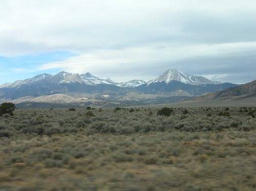 Aerial view of Colorado's Costilla County land parcel in San Luis Valley, showcasing open terrain and surrounding landscape.