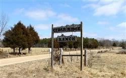 Aerial view of Missouri Cedar Ridge Ranch Lot 2 in Phelps County, showing wooded 5.18-acre land parcel.