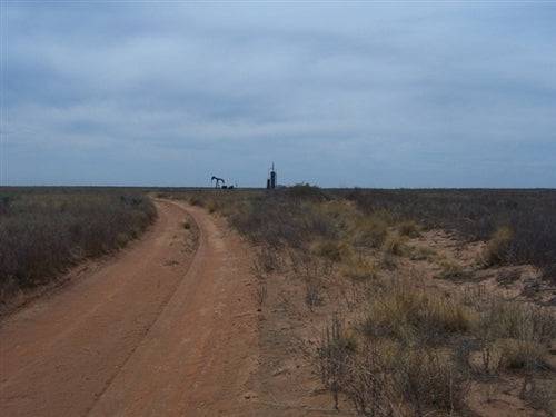 Aerial view of Cochran County, Texas, showing 2-acre Western Vistas property with open plains and distant mountains.