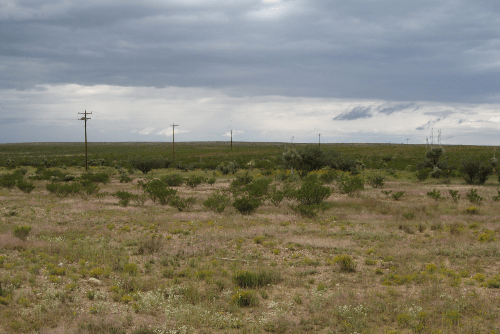 Aerial view of Texas Hudspeth County 5.57-acre La Hacienda Estates Lot 688 Unit 2, showing land and surrounding desert landscape.